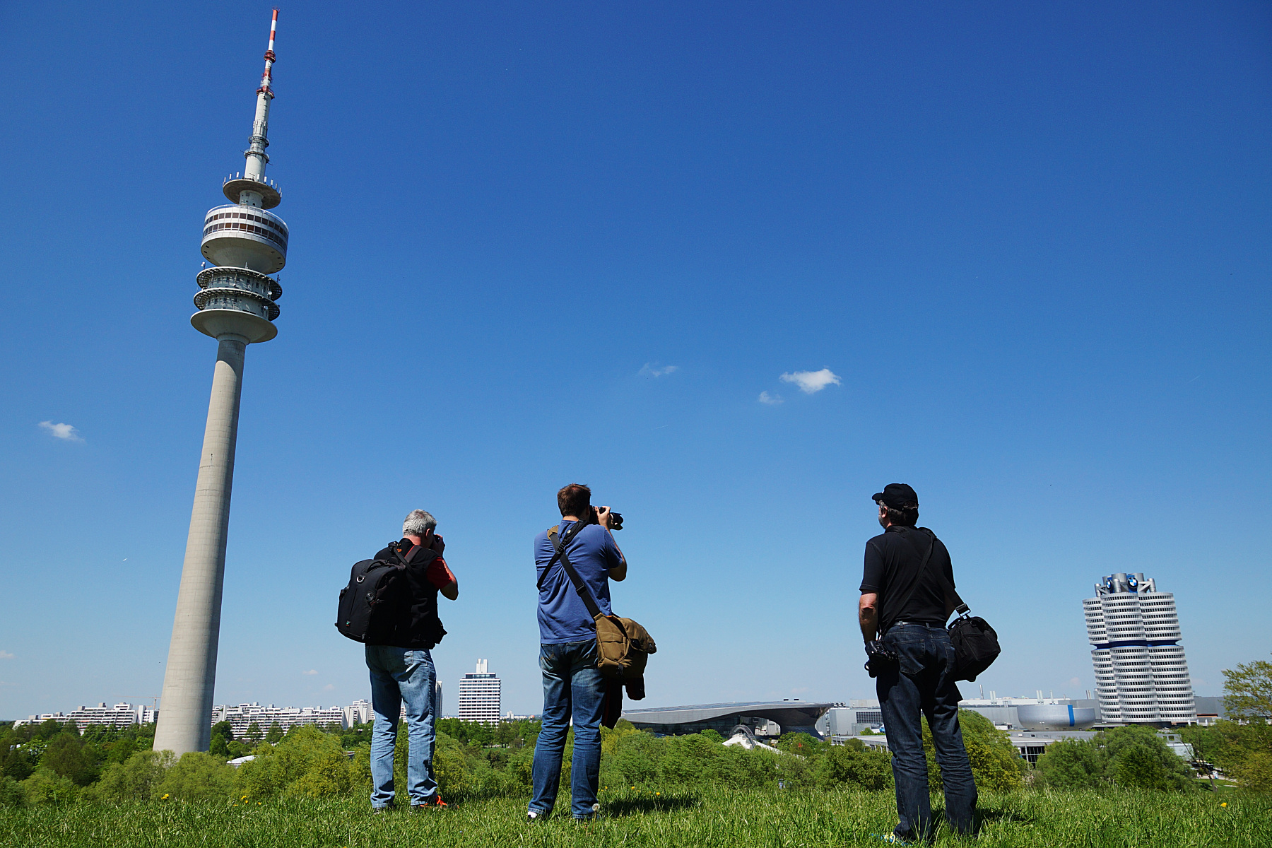 Drei Fotografen