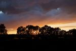 Sonnenuntergang mit Wolkenstimmung bei Übersee