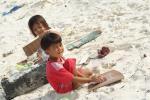 Philippinische Kinder am Strand